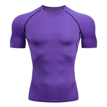 Camisa de compressão masculina roxa com costura preta, modelo dry fit com alta elasticidade e conforto térmico para musculação e corrida