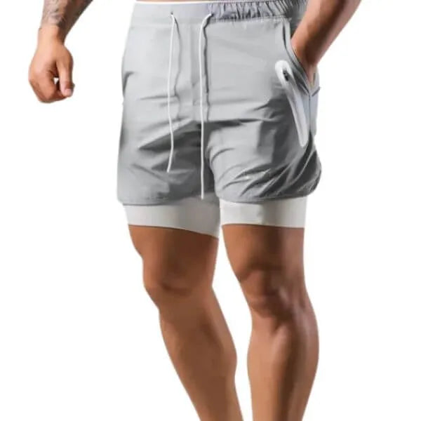 Short 2 em 1 masculino cinza claro com compressão branca e bolso lateral para celular, ideal para treino funcional